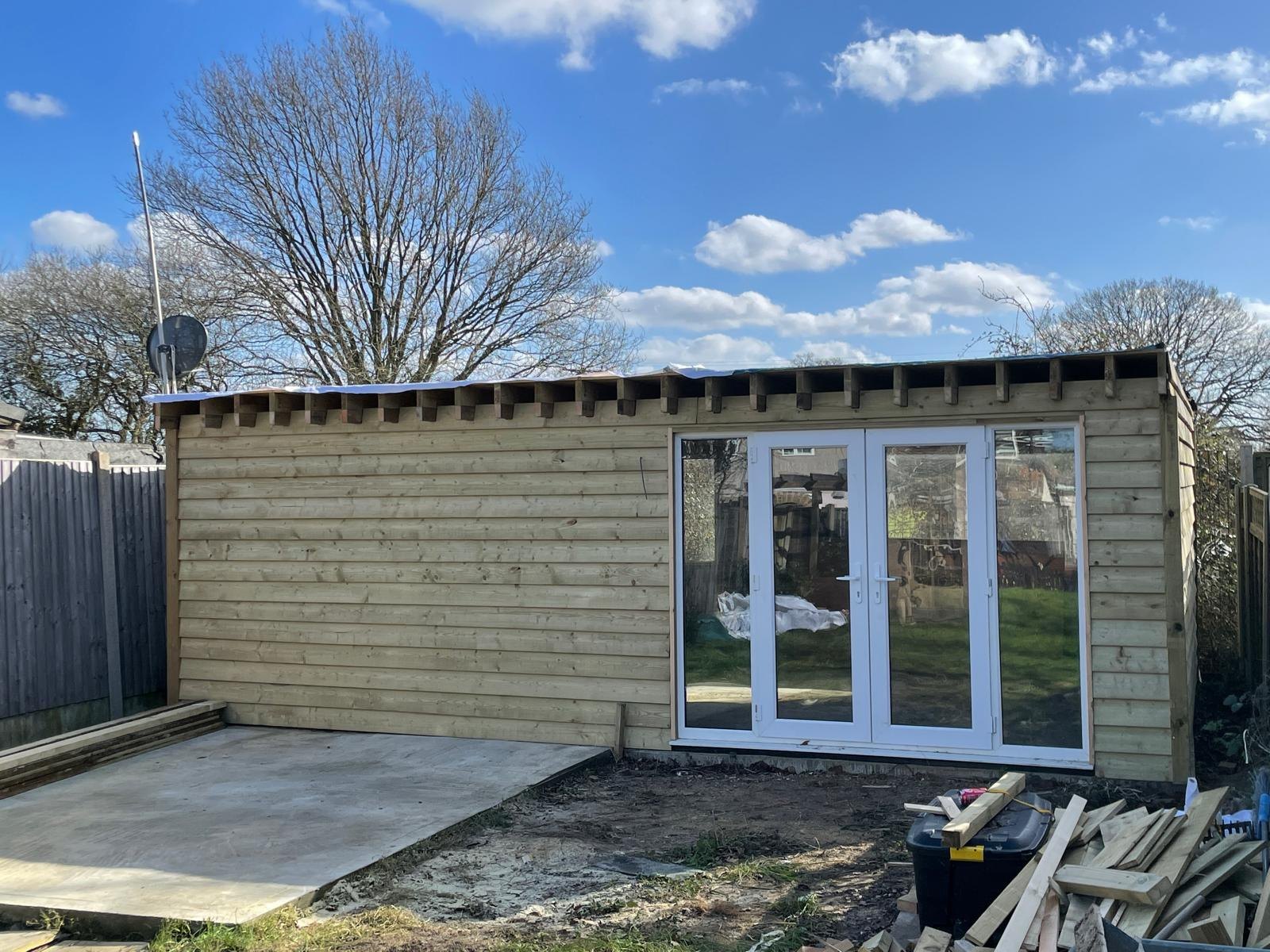 Timber clad garden office on a new slab with French doors