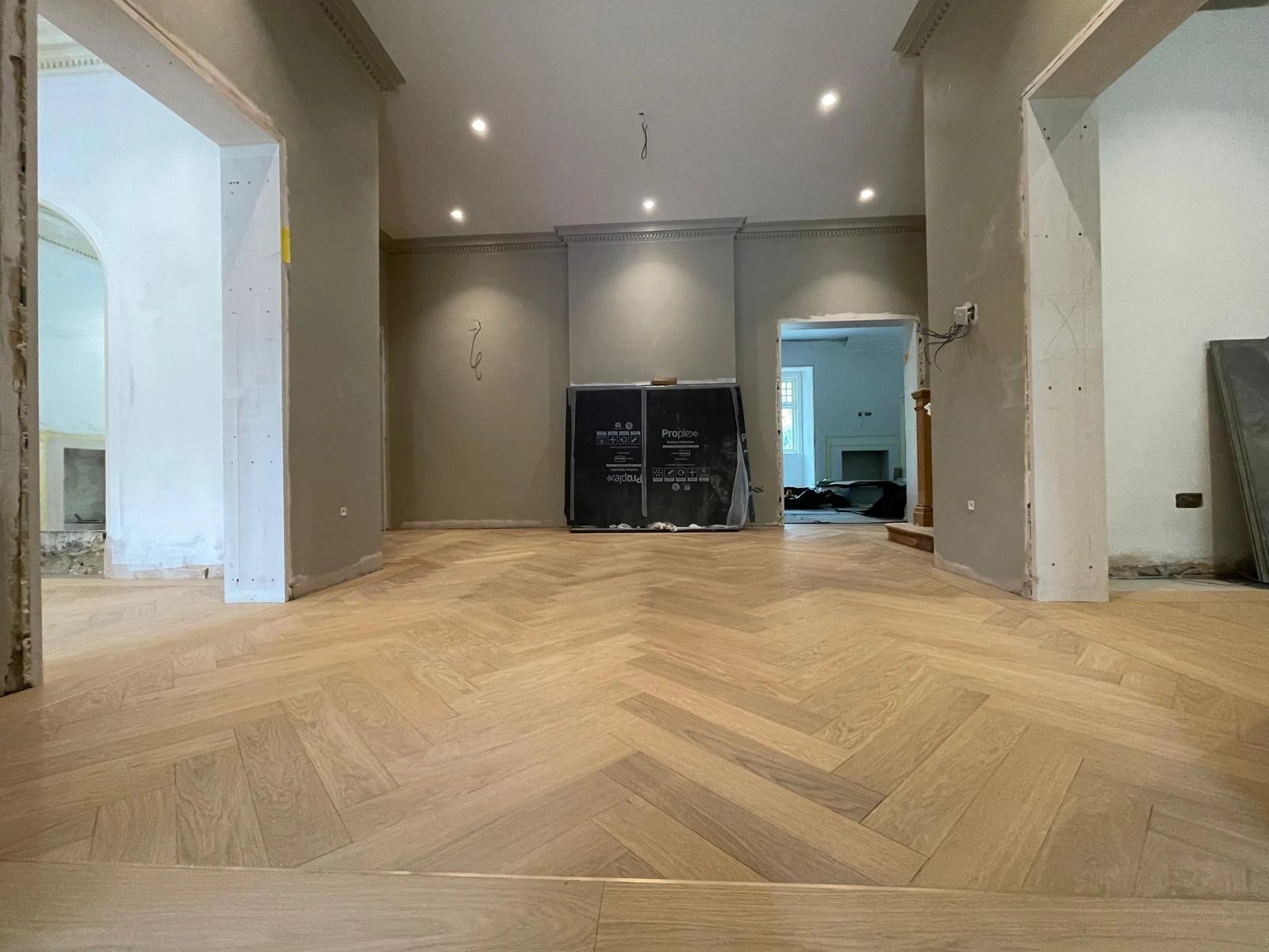 Light oak herringbone floor laid through a period house mid renovation